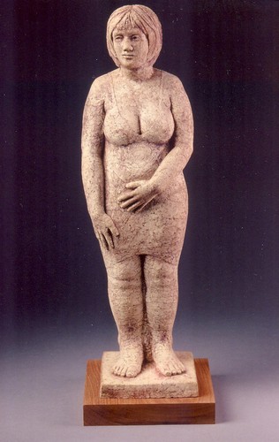 WOMAN AT THE BUS STOP by norman holen