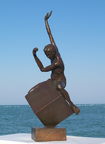 MALE RIDING A CUBE (2010) by james gabbert